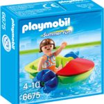 Copil cu barca Playmobil