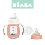 Sticla pentru a invata sa bea 2in1 Learning Bottle 210ml cu husa din silicon roz de la 4 luni Beaba